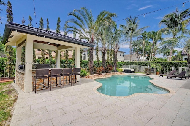 19323 SW 55th St, Miramar, FL 33029 - view of pool with a fenced in pool, outdoor dry bar, fence private yard, and a patio area
