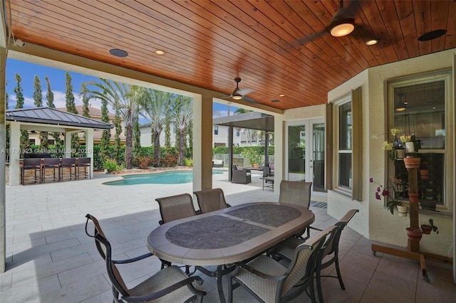 19323 SW 55th St, Miramar, FL 33029 - view of patio featuring ceiling fan, a fenced in pool, and outdoor dry bar