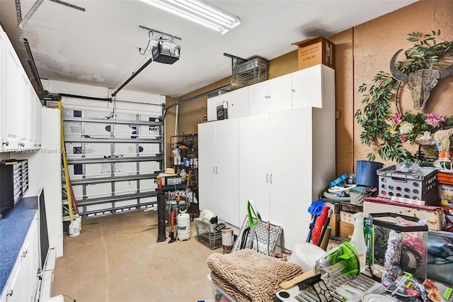 19323 SW 55th St, Miramar, FL 33029 - garage featuring a textured wall and a garage door opener