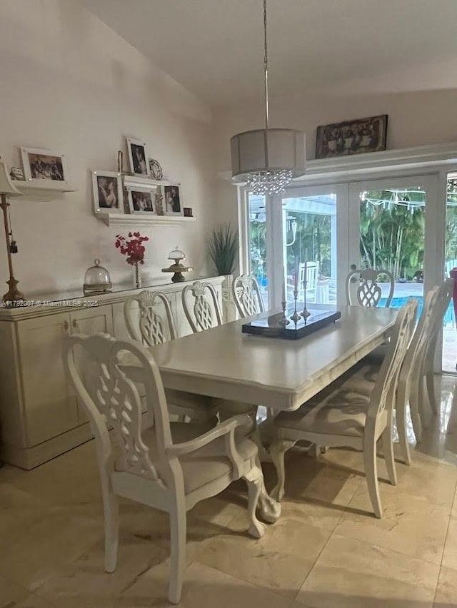 19720 SW 79th Ct, Cutler Bay, FL 33189 - dining space with a notable chandelier