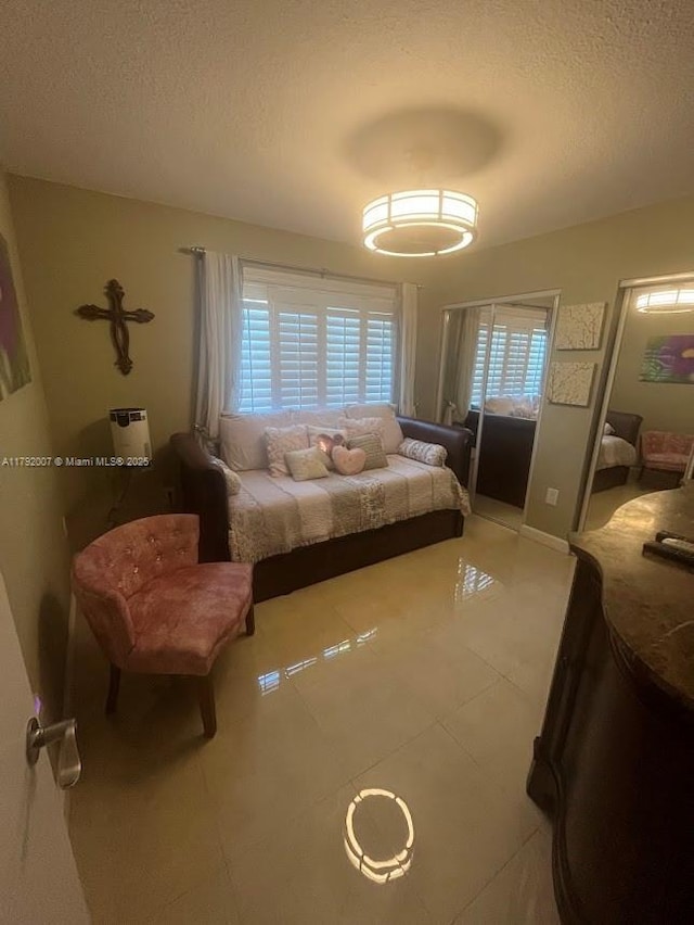 19720 SW 79th Ct, Cutler Bay, FL 33189 - tiled bedroom with a textured ceiling