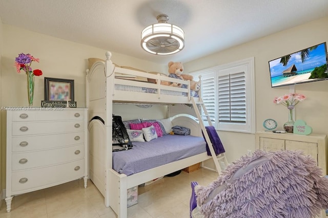 19720 SW 79th Ct, Cutler Bay, FL 33189 - bedroom with light tile patterned floors and a ceiling fan