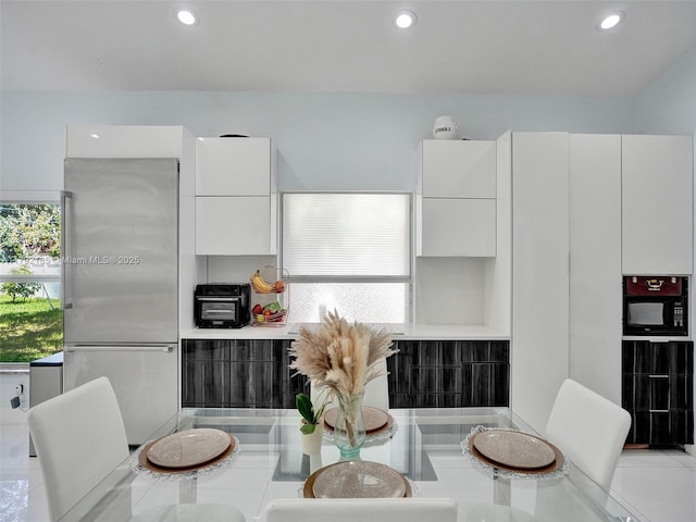 dining room featuring recessed lighting