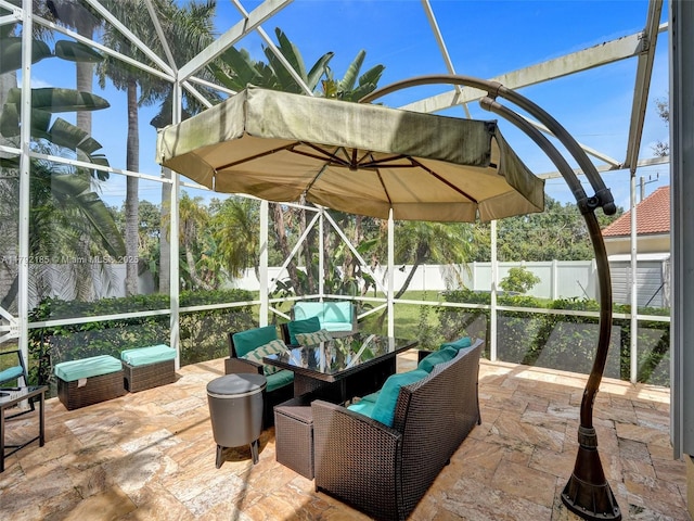 sunroom / solarium with plenty of natural light and outdoor dining space