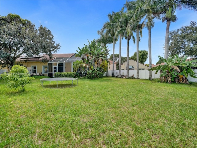10937 NW 46th Dr, Coral Springs, FL 33076 - view of yard featuring a trampoline