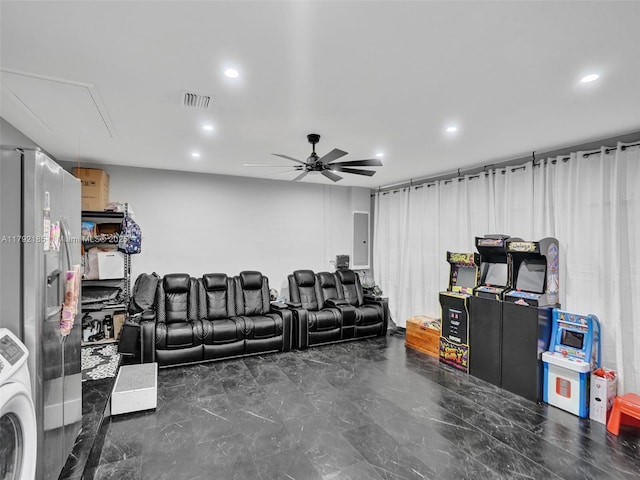 home theater featuring a ceiling fan, recessed lighting, washer / dryer, visible vents, and electric panel