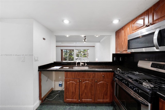 17911 NW 68th Ave Unit P208, Hialeah, FL 33015 - kitchen featuring recessed lighting, appliances with stainless steel finishes, brown cabinets, a sink, and baseboards