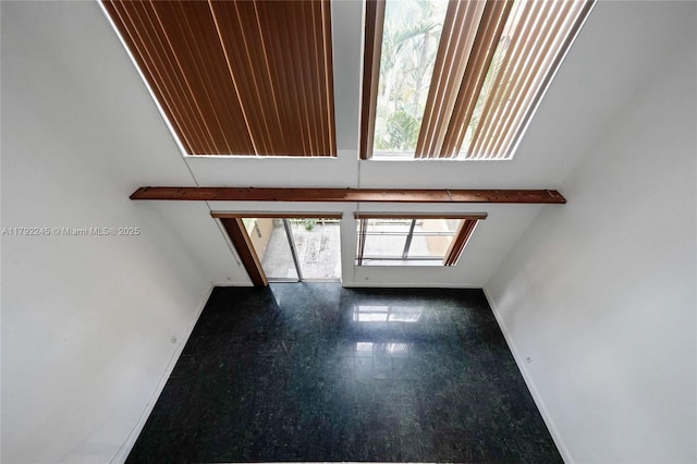 17911 NW 68th Ave Unit P208, Hialeah, FL 33015 - empty room with baseboards