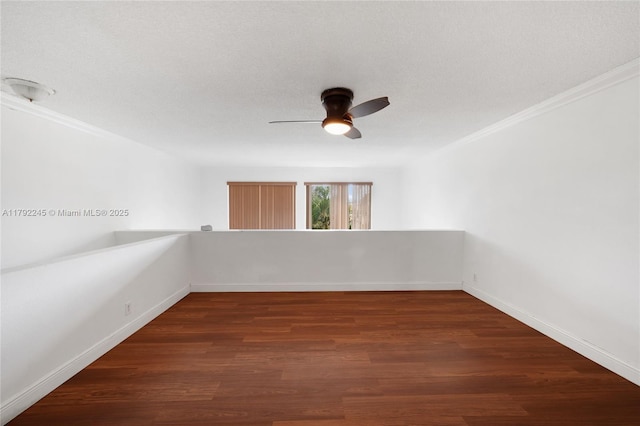 17911 NW 68th Ave Unit P208, Hialeah, FL 33015 - spare room featuring ornamental molding, a ceiling fan, wood finished floors, and baseboards