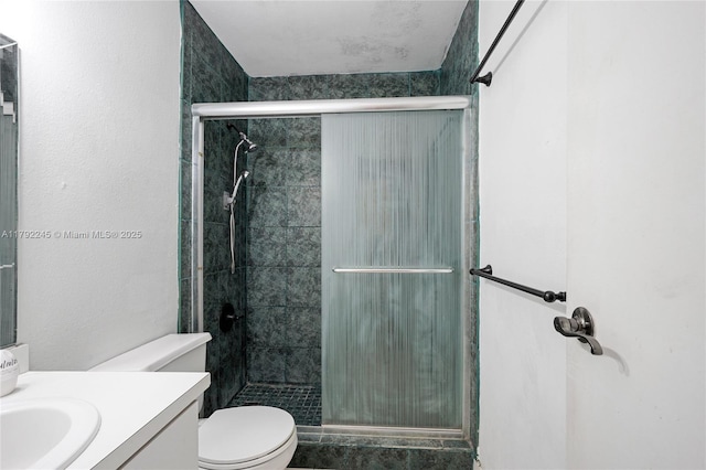 17911 NW 68th Ave Unit P208, Hialeah, FL 33015 - full bathroom featuring toilet, vanity, and a shower stall