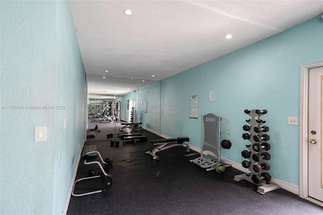 17911 NW 68th Ave Unit P208, Hialeah, FL 33015 - workout area with a textured ceiling and recessed lighting