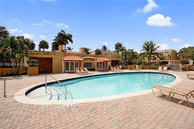 17911 NW 68th Ave Unit P208, Hialeah, FL 33015 - pool featuring fence, french doors, and a patio area