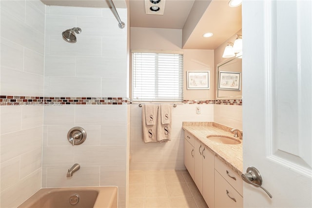bathroom with vanity,  shower combination, tile patterned flooring, and recessed lighting