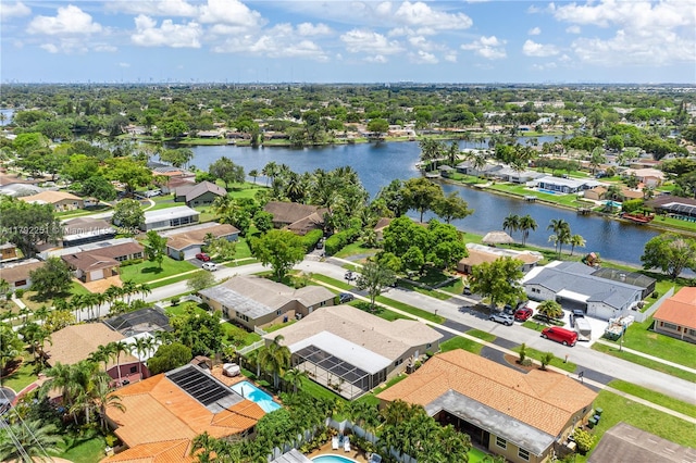 aerial view featuring a water view and a residential view