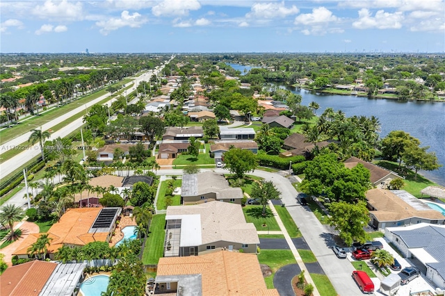 aerial view with a water view and a residential view