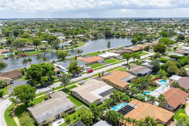 aerial view featuring a residential view and a water view