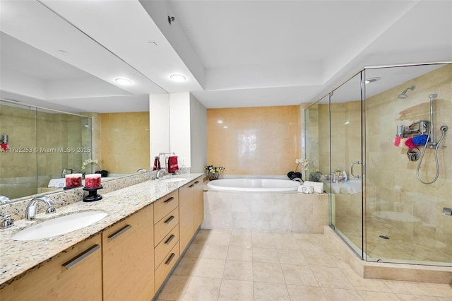 1830 S Ocean Dr Unit 1201, Hallandale Beach, FL 33009 - bathroom with a sink, a tray ceiling, a stall shower, and a garden tub