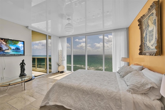 1830 S Ocean Dr Unit 1201, Hallandale Beach, FL 33009 - bedroom with stone tile floors, a water view, and access to exterior