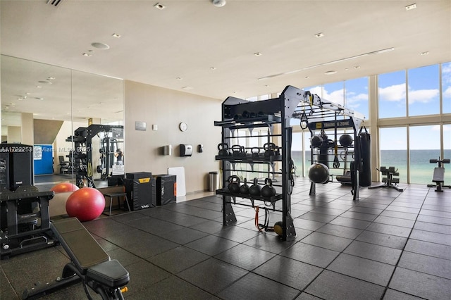 1830 S Ocean Dr Unit 1201, Hallandale Beach, FL 33009 - workout area with a water view and a wall of windows