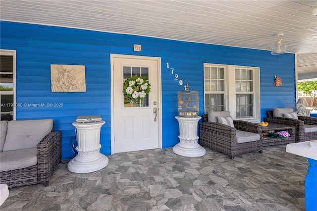 entrance to property with a porch