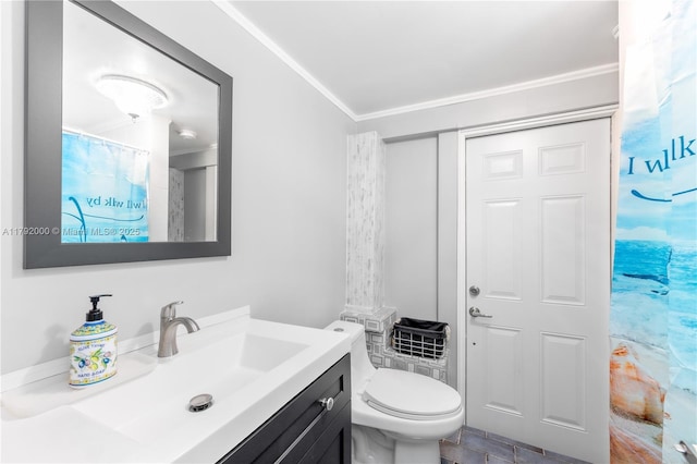 bathroom featuring toilet, ornamental molding, and vanity