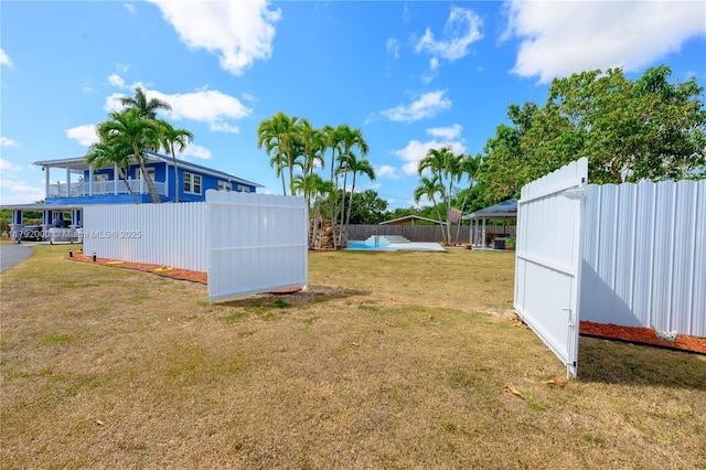 view of yard featuring fence