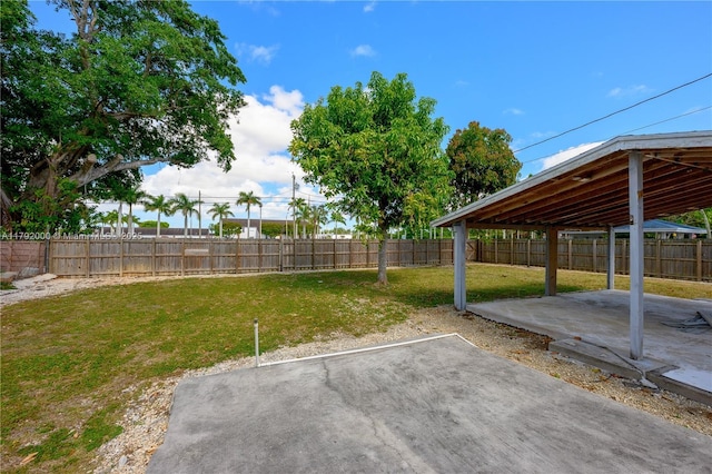 view of yard with a patio and a fenced backyard