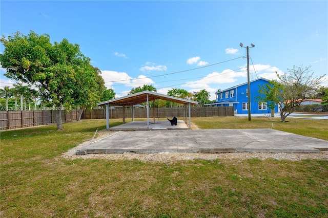 view of home's community with a gazebo, a carport, a yard, and a patio area
