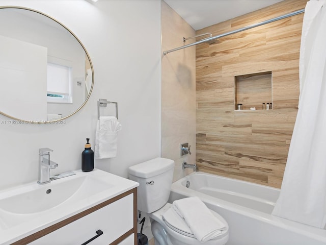 bathroom with shower / bath combination with curtain, toilet, and vanity
