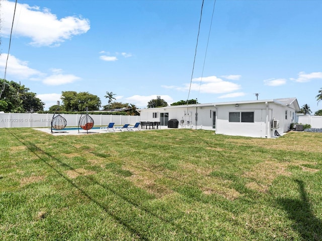view of yard with a fenced in pool, a patio area, and a fenced backyard