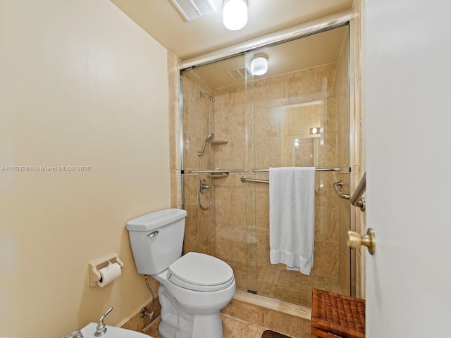 1300 SW 122nd Ave Unit 303-2, Miami, FL 33184 - full bathroom featuring a stall shower, toilet, and tile patterned floors