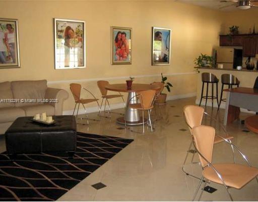 living area with baseboards