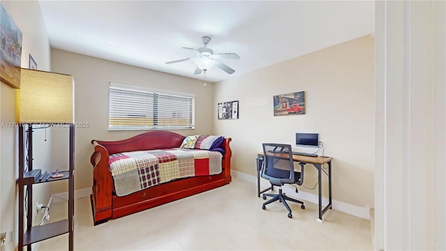 bedroom with baseboards and a ceiling fan