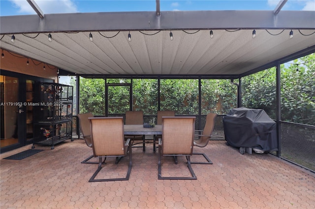 view of patio featuring grilling area and outdoor dining space