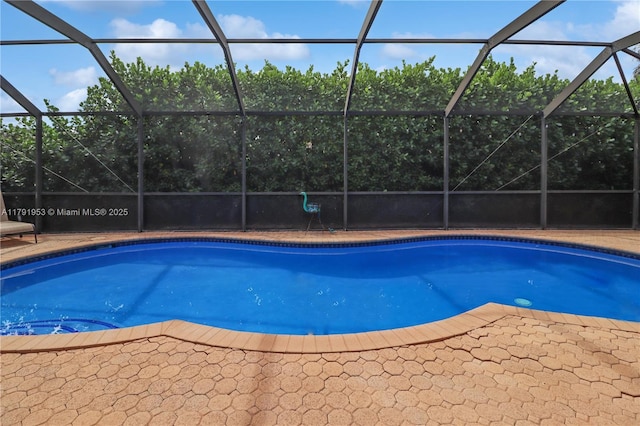 pool featuring glass enclosure