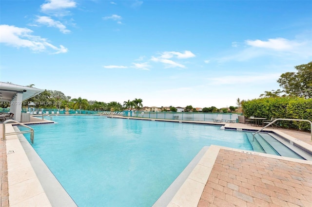 pool with a patio area