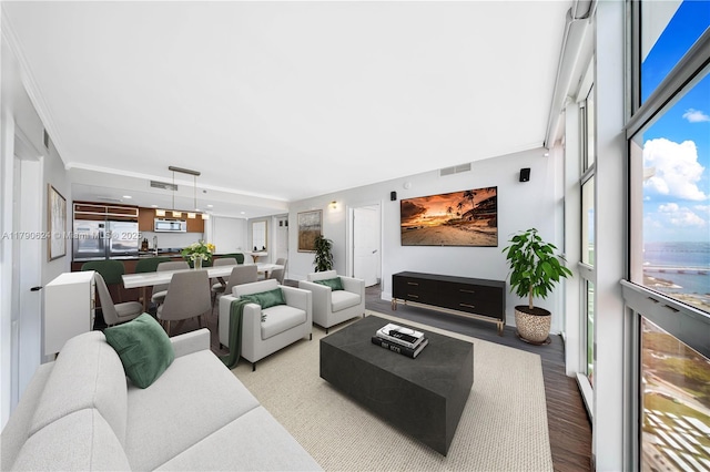 50 Biscayne Blvd Unit 4004, Miami, FL 33132 - living room with visible vents, ornamental molding, wood finished floors, and recessed lighting