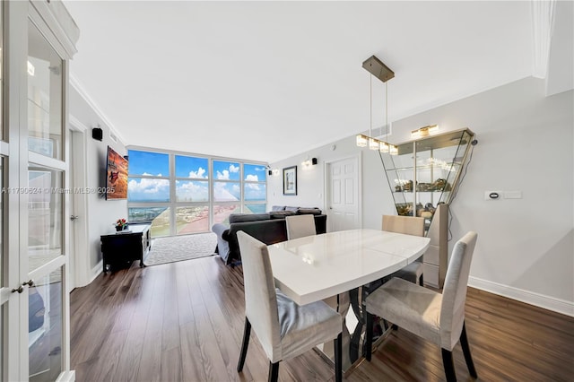 50 Biscayne Blvd Unit 4004, Miami, FL 33132 - dining room featuring dark wood-style floors, baseboards, ornamental molding, and a chandelier