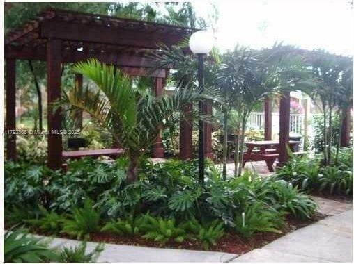 view of yard with a pergola