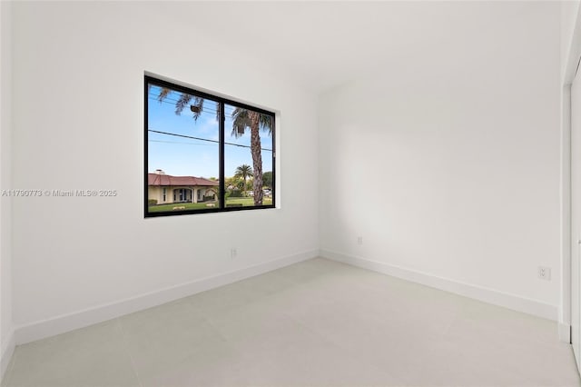 19601 E Saint Andrews Dr, Hialeah, FL 33015 - tiled empty room with baseboards