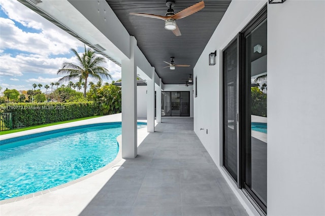 19601 E Saint Andrews Dr, Hialeah, FL 33015 - view of swimming pool featuring a fenced in pool, a patio, ceiling fan, and fence