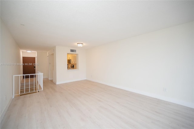 9210 Fontainebleau Blvd Unit 505, Miami, FL 33172 - spare room with light wood-style flooring and baseboards