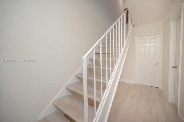 9210 Fontainebleau Blvd Unit 505, Miami, FL 33172 - stairway with wood finished floors and baseboards