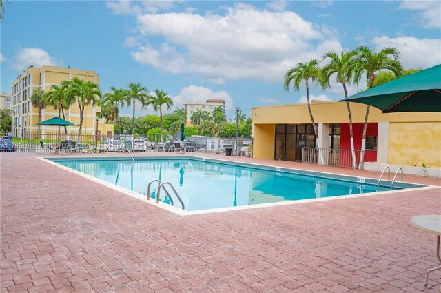 9210 Fontainebleau Blvd Unit 505, Miami, FL 33172 - community pool featuring a patio