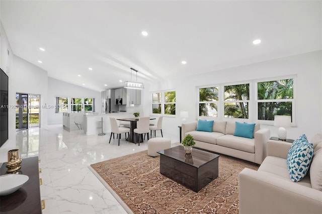 11069 Rios Rd, Boca Raton, FL 33498 - living area with recessed lighting, vaulted ceiling, a wealth of natural light, and marble finish floor