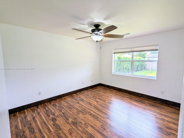7431 SW 135th Ave, Miami, FL 33183 - spare room with a ceiling fan, baseboards, dark wood finished floors, and visible vents