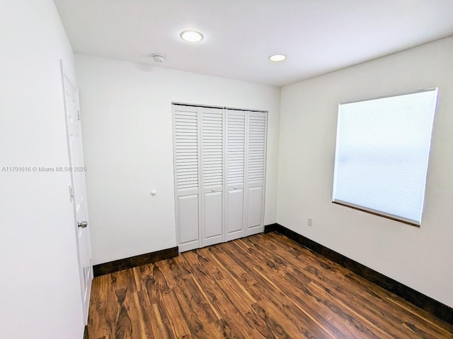 7431 SW 135th Ave, Miami, FL 33183 - unfurnished bedroom with recessed lighting, baseboards, dark wood finished floors, and a closet