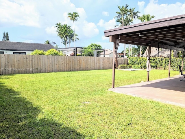 7431 SW 135th Ave, Miami, FL 33183 - view of yard with a fenced backyard and a patio area