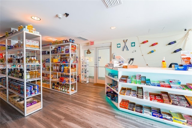 interior space with visible vents, wood finished floors, and recessed lighting