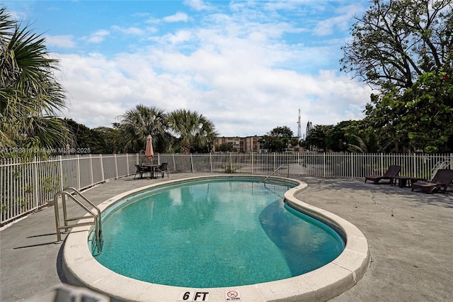 5435 NW 10th Ct Unit 301, Plantation, FL 33313 - community pool featuring a patio area